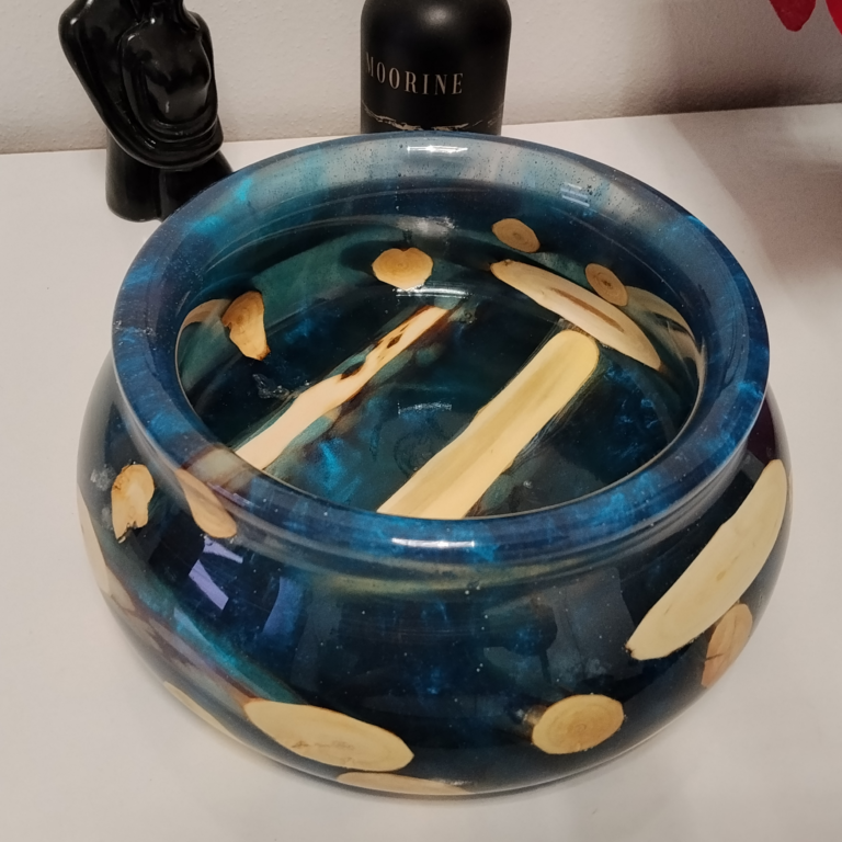 Floating wood immersed in resin, like beneath a tranquil water surface.